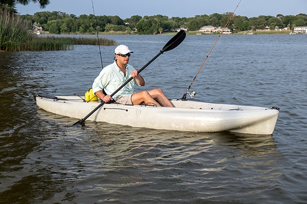 man fishing in kayak