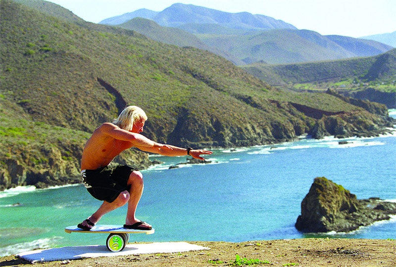 surfer using indo balance board
